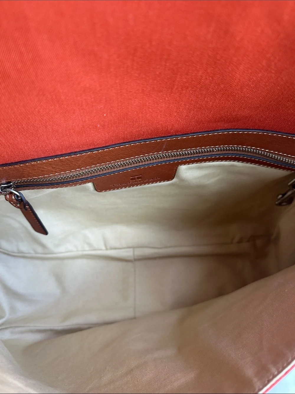 Trafalgar men’s messenger bag burnt orange with leather trim! Live New